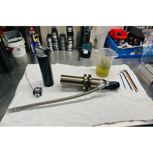 COMP SHOCKS SERVICING/REBUILD & WARRANTY FROM